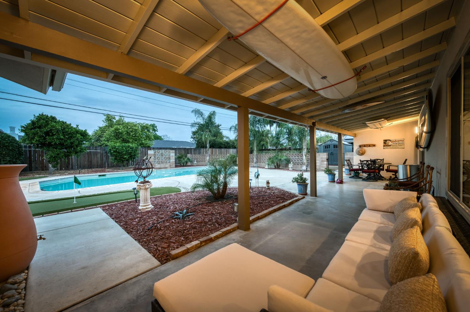1540 West San Ramon Avenue Fresno, CA 93711 - Photo 28 of 32 a view of a backyard with swimming pool