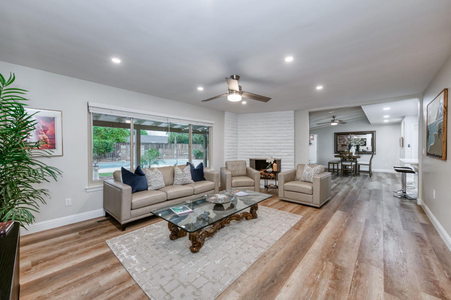 1540 West San Ramon Avenue Fresno, CA 93711 - Photo 6 of 32 a living room with furniture and a large window