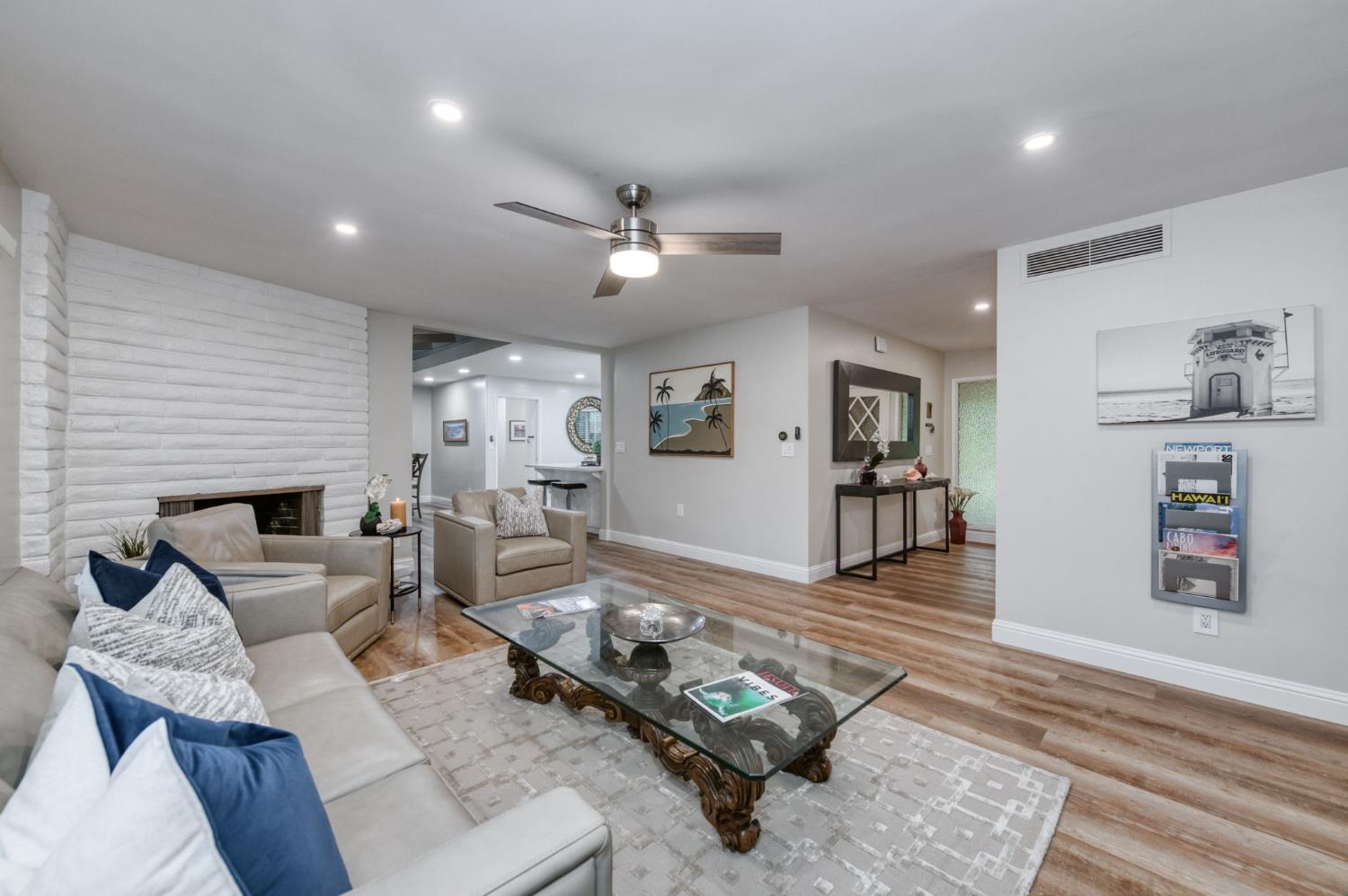 1540 West San Ramon Avenue Fresno, CA 93711 - Photo 9 of 32 a living room with furniture and wooden floor