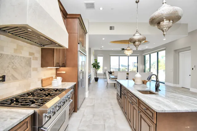 a kitchen with a sink and a window