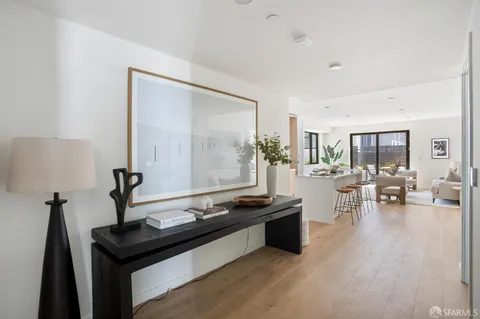 a open kitchen with sink cabinets and dining table