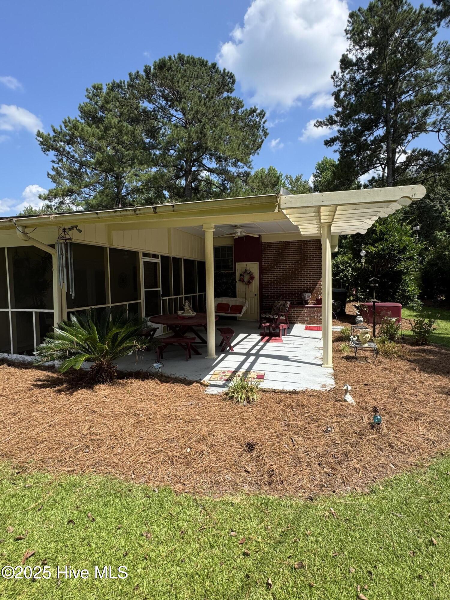 136 Brown Maultsby Road Whiteville, NC 28472 - Photo 24 of 25 Backyard Sitting