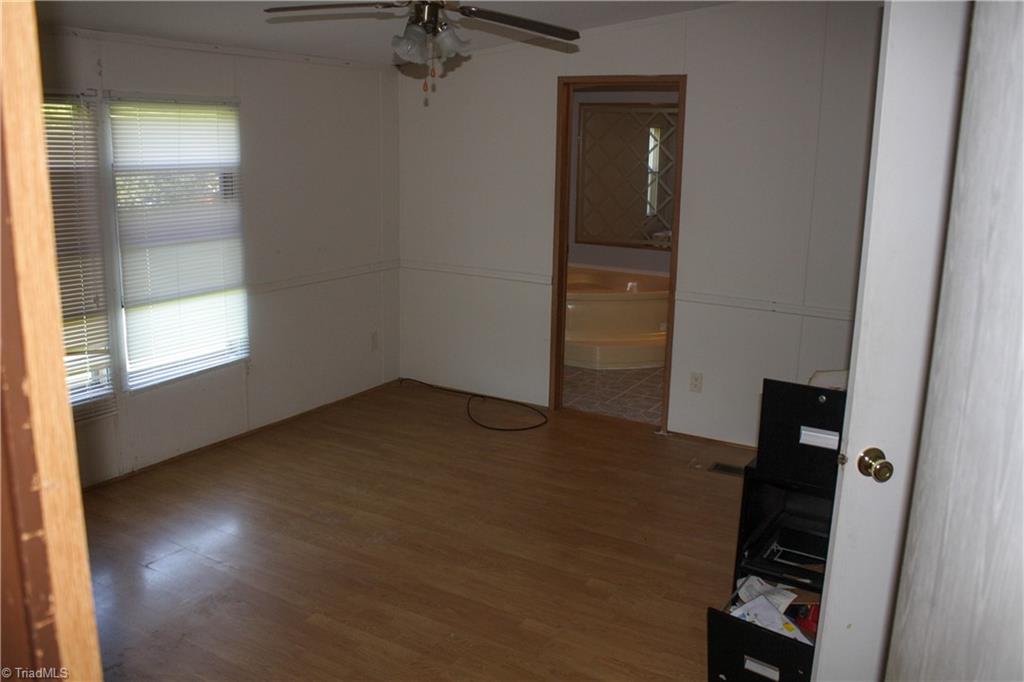 106 Childrens Home Road Mocksville, NC 27028 - Photo 6 of 12 Primary Bedroom with adjoining private bathroom