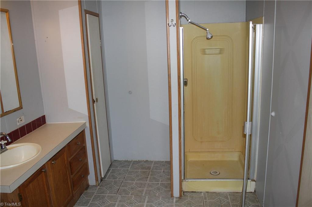 106 Childrens Home Road Mocksville, NC 27028 - Photo 8 of 12 Separate shower in primary bathroom
