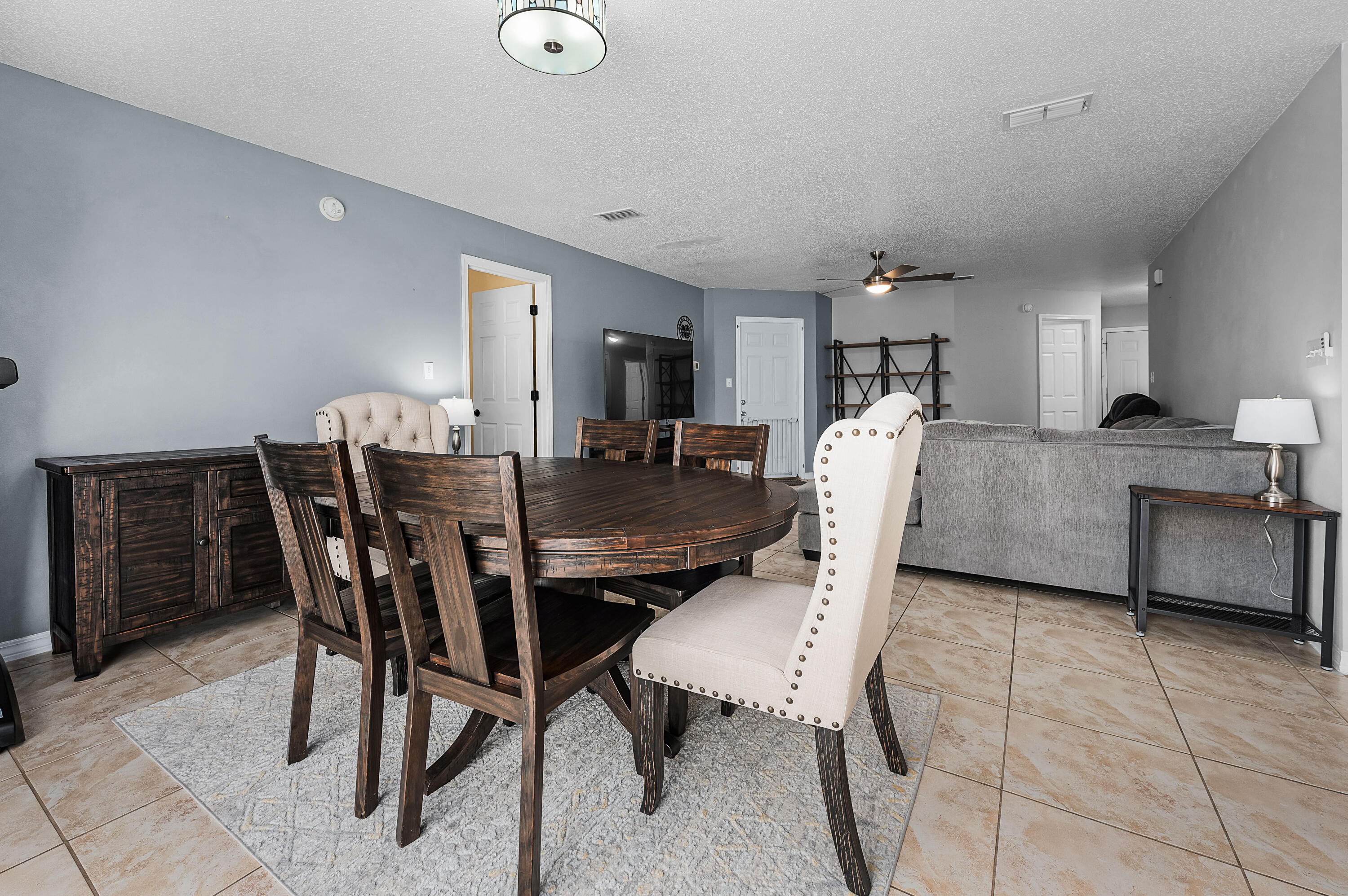 281 Limestone Circle Crestview, FL 32539 - Photo 13 of 46 a view of a dining room with furniture