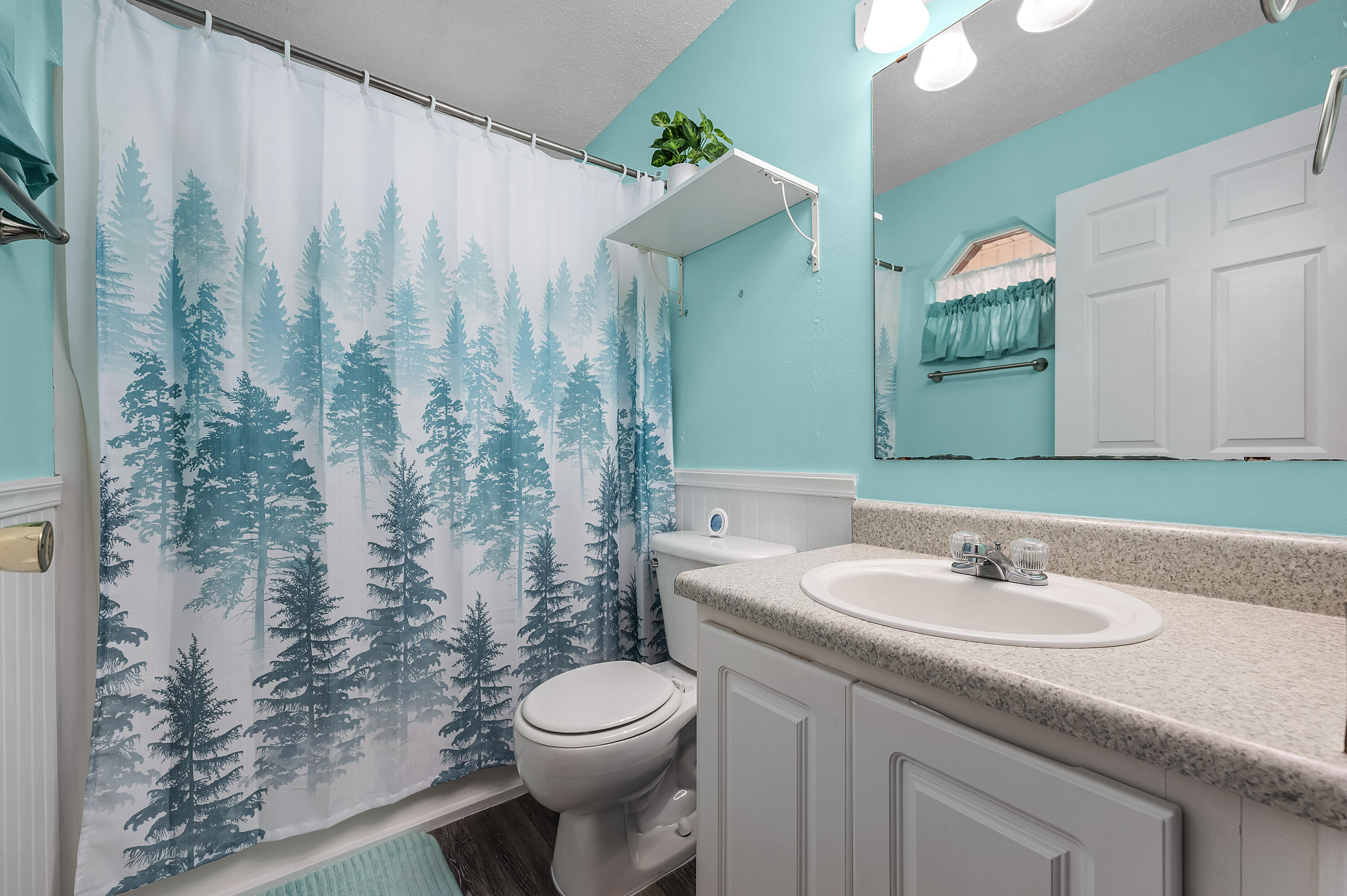 281 Limestone Circle Crestview, FL 32539 - Photo 29 of 46 a bathroom with a granite countertop sink a toilet and a mirror