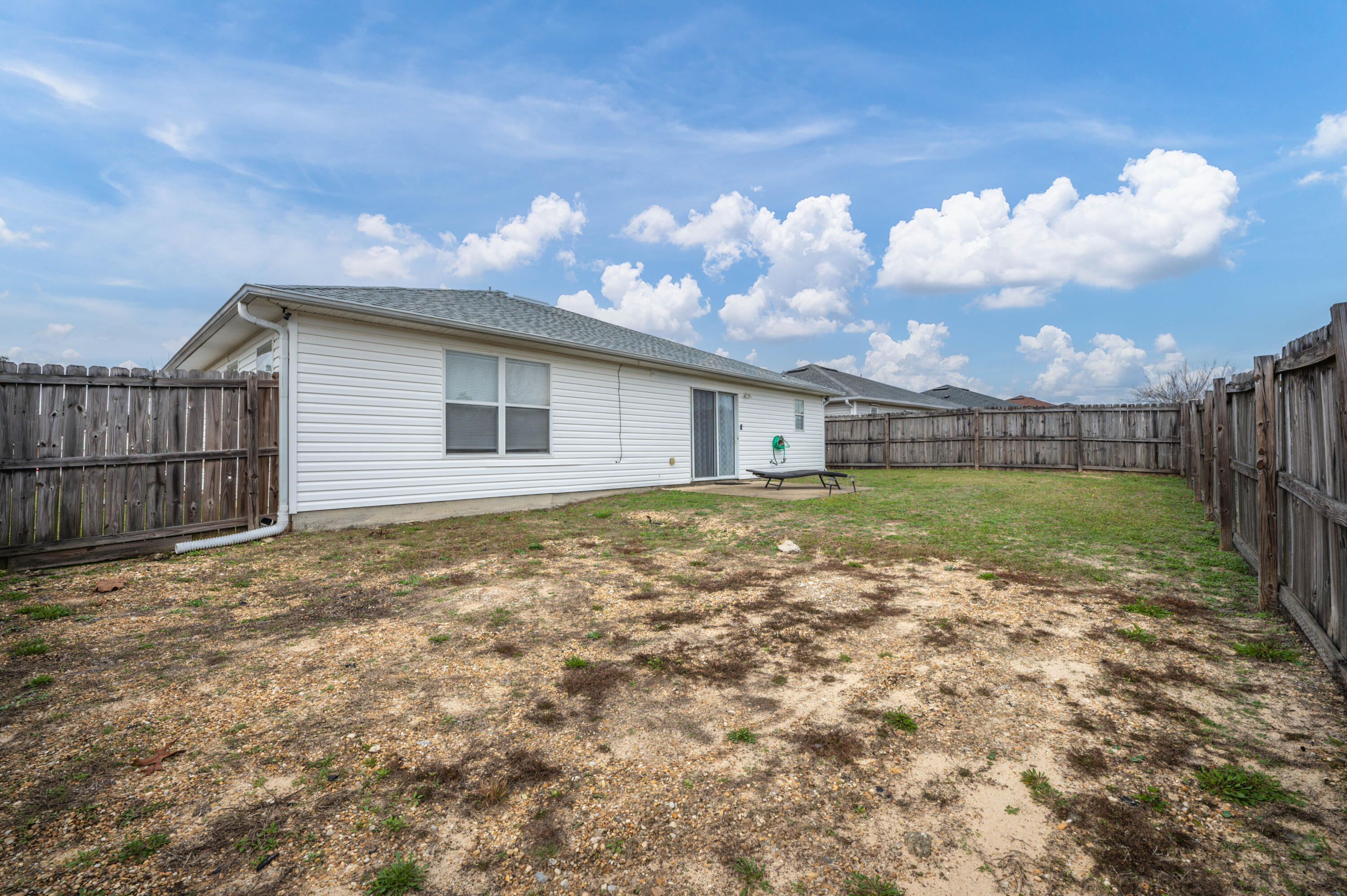 281 Limestone Circle Crestview, FL 32539 - Photo 40 of 46 a view of a house with a yard