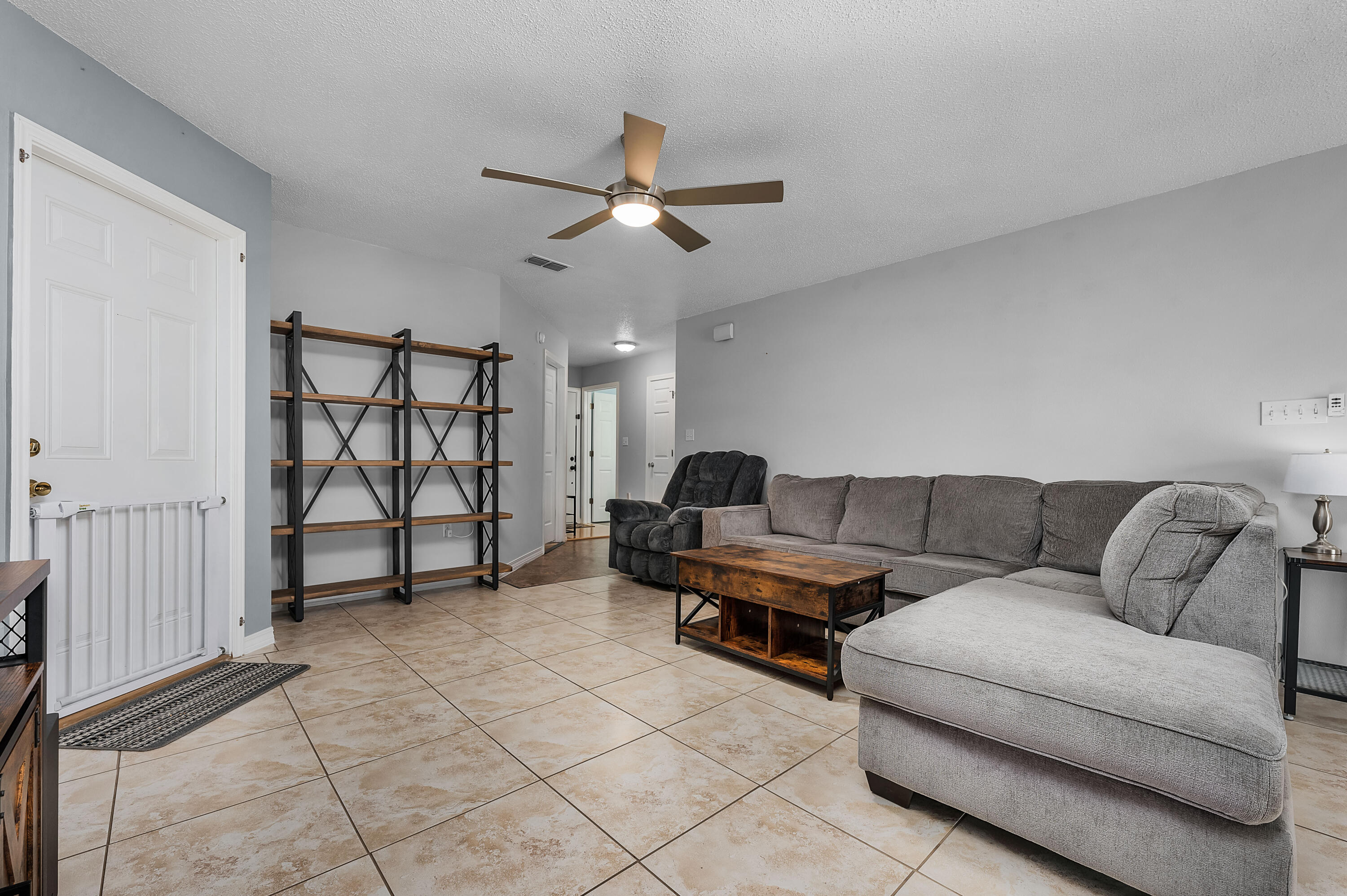 281 Limestone Circle Crestview, FL 32539 - Photo 9 of 46 a living room with furniture