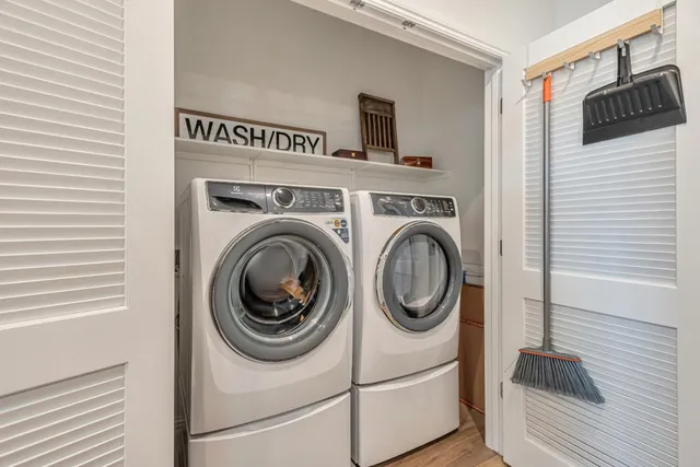 a utility room with dryer and washer