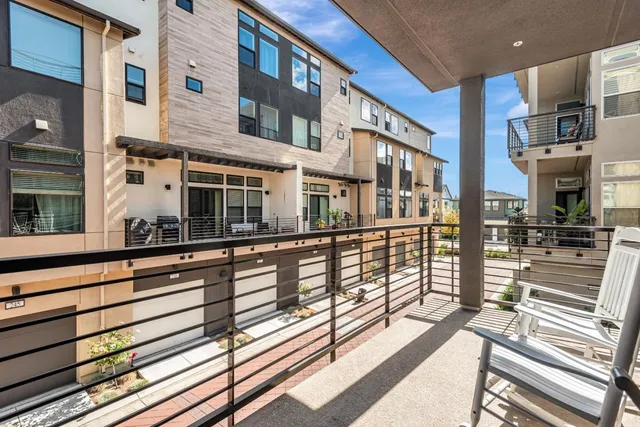 a view of a building from a balcony
