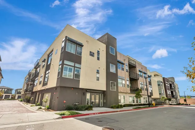 a view of a building with a street