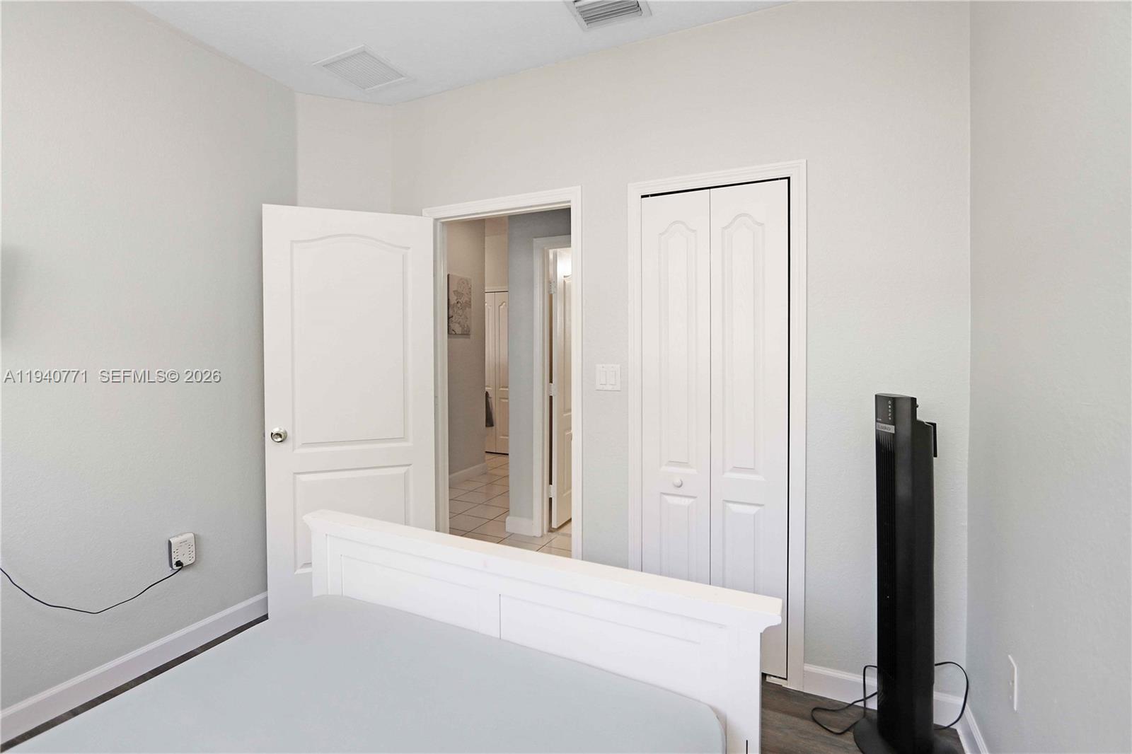 14973 Southwest 8th Terrace Miami, FL 33194 - Photo 14 of 32 a bedroom with a bed and a shower