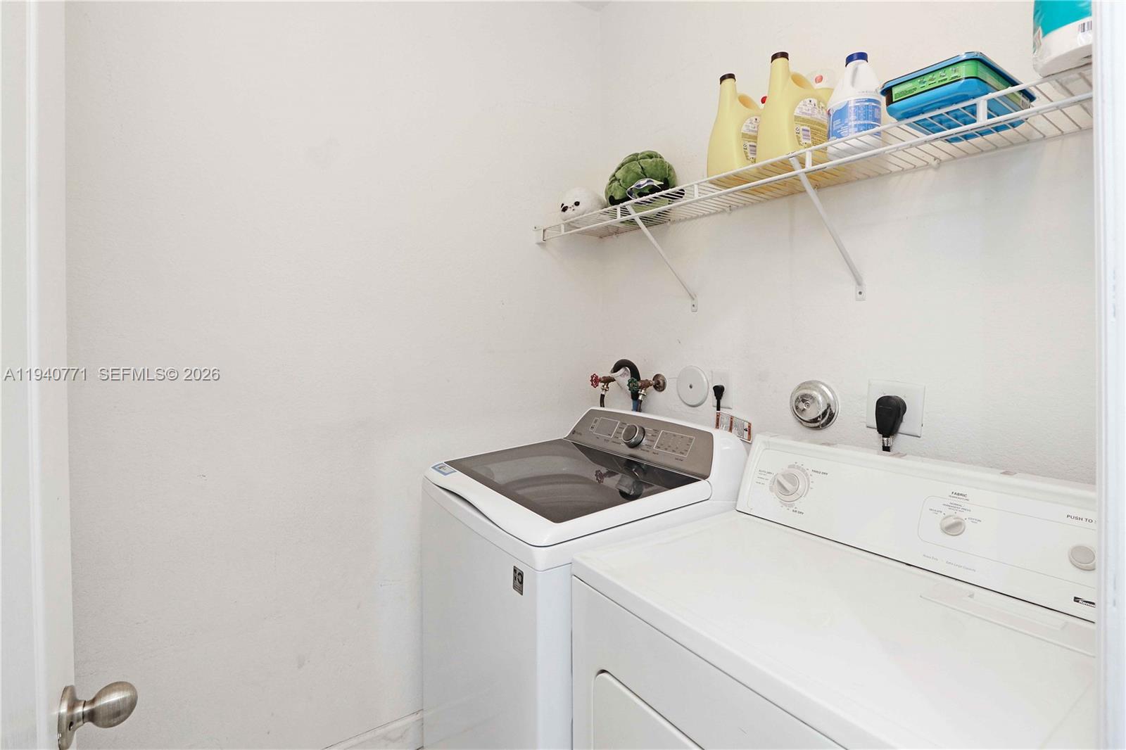 14973 Southwest 8th Terrace Miami, FL 33194 - Photo 18 of 32 a bathroom with a sink and a vanity with wooden floor