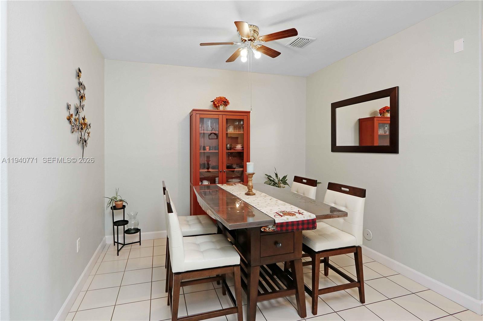 14973 Southwest 8th Terrace Miami, FL 33194 - Photo 5 of 32 a view of a dining room with furniture