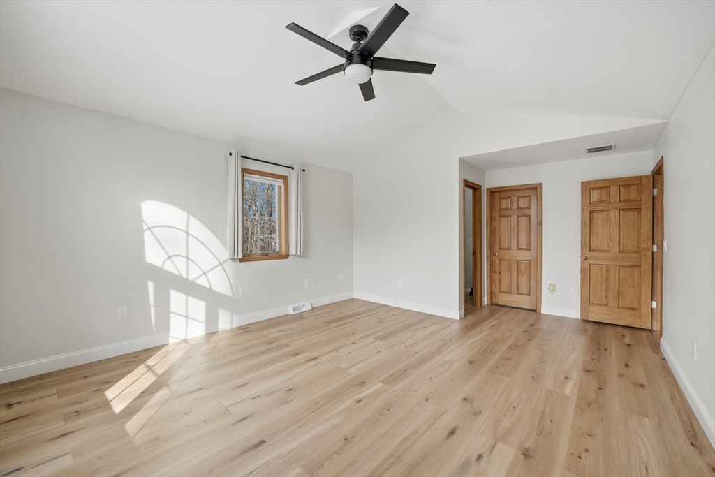 37 Wyndermere Place Ludlow, MA 01056 - Photo 20 of 42 a view of empty room with wooden floor and fan