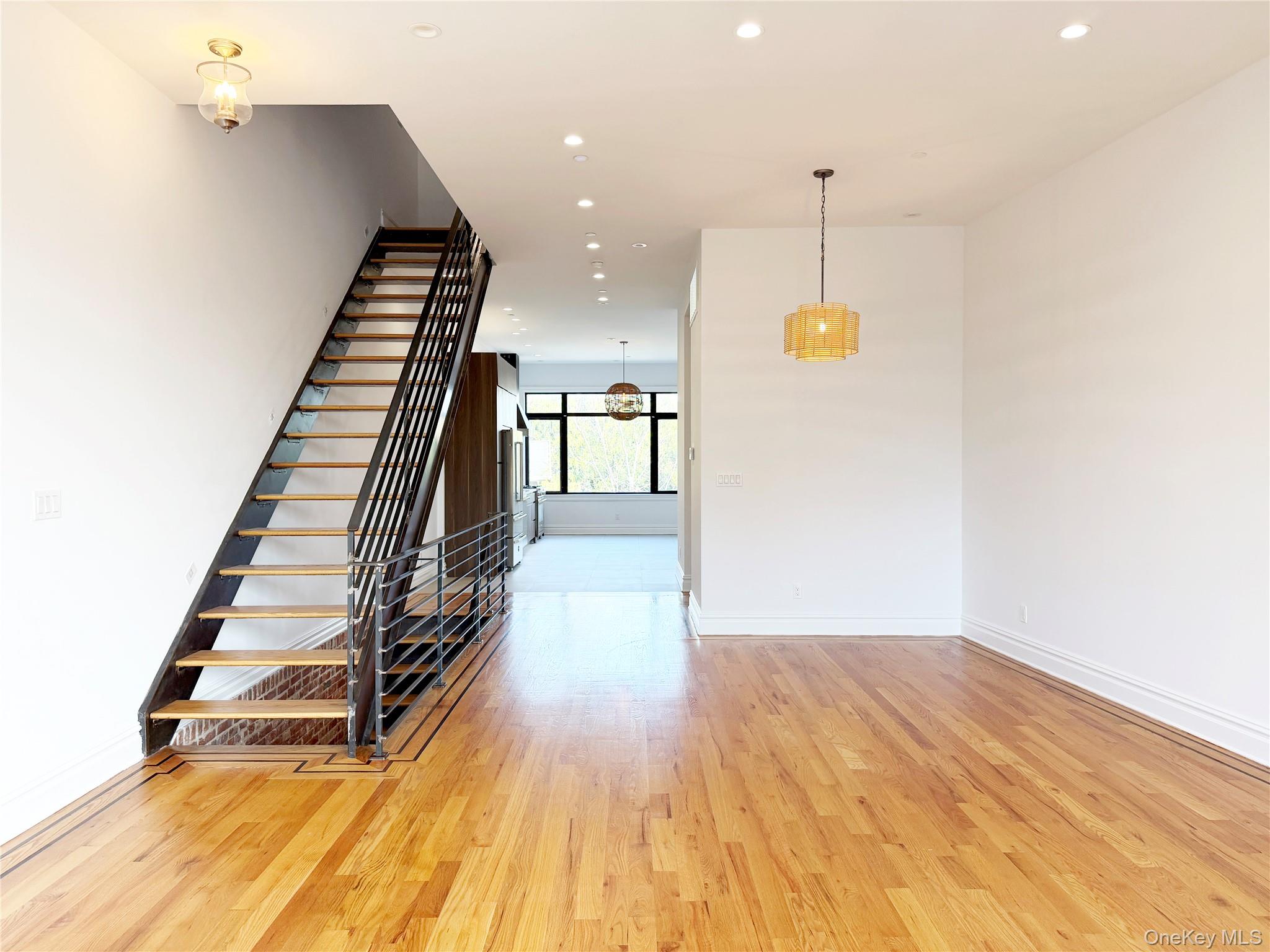 333 Tompkins Avenue, Unit PH2 Brooklyn, NY 11216 - Photo 16 of 33 a view of entryway and hall with wooden floor