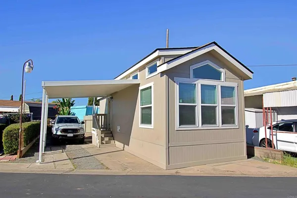 a front view of a house with a porch