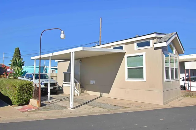 a front view of a house with a garage