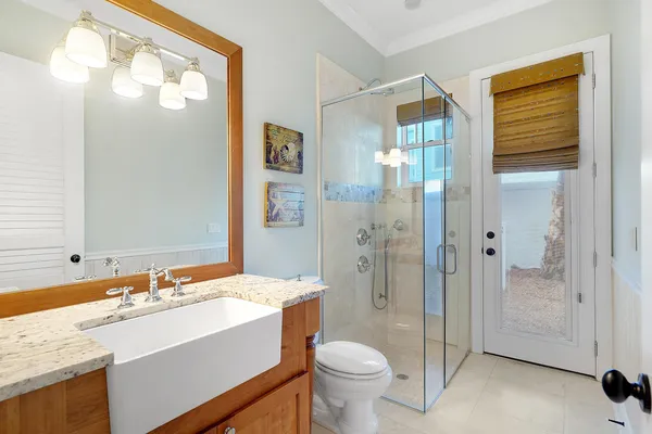 an aerial view of multiple houses with outdoor space