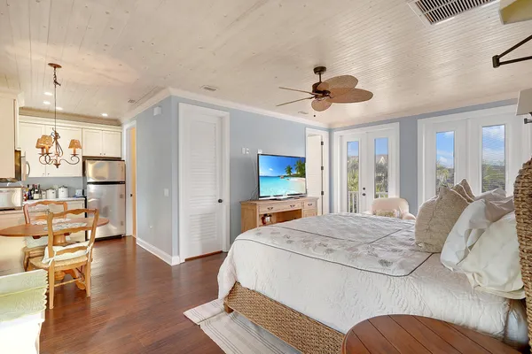 a bedroom with a bed furniture and a window