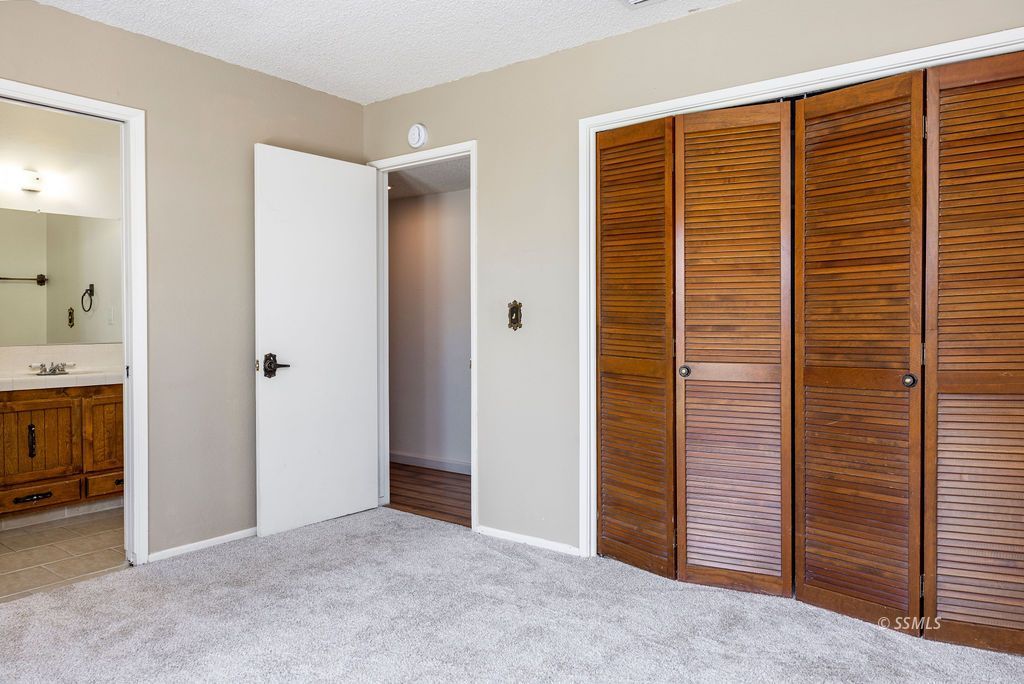 1144 West Benson Avenue Ridgecrest, CA 93555 - Photo 23 of 32 a view of livingroom with closet