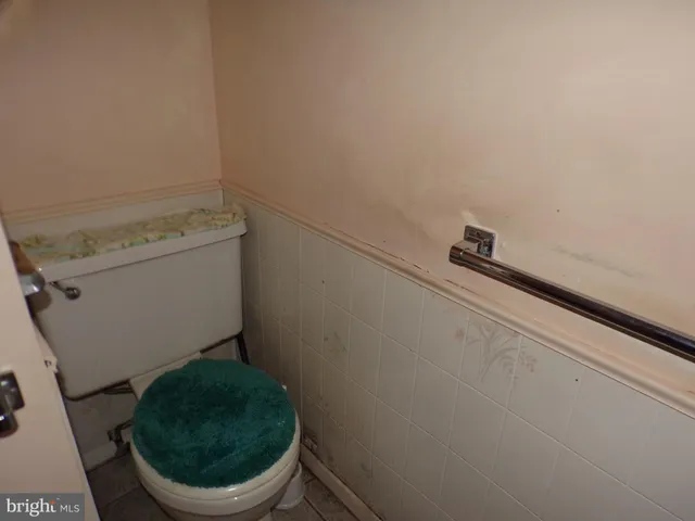 a close up of a toilet and a sink