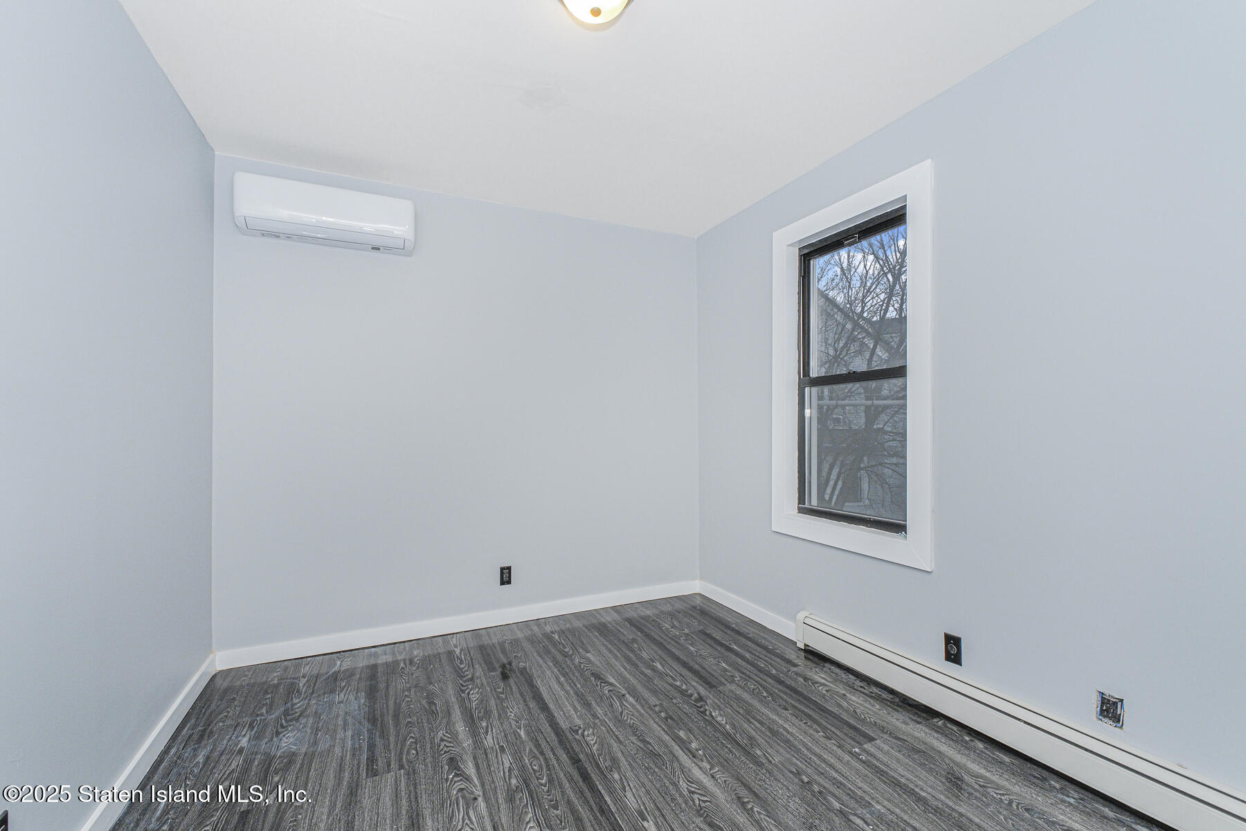 71 Sands Street Staten Island, NY 10304 - Photo 13 of 35 an empty room with windows