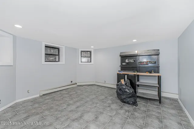 a view of room with racks on the wall