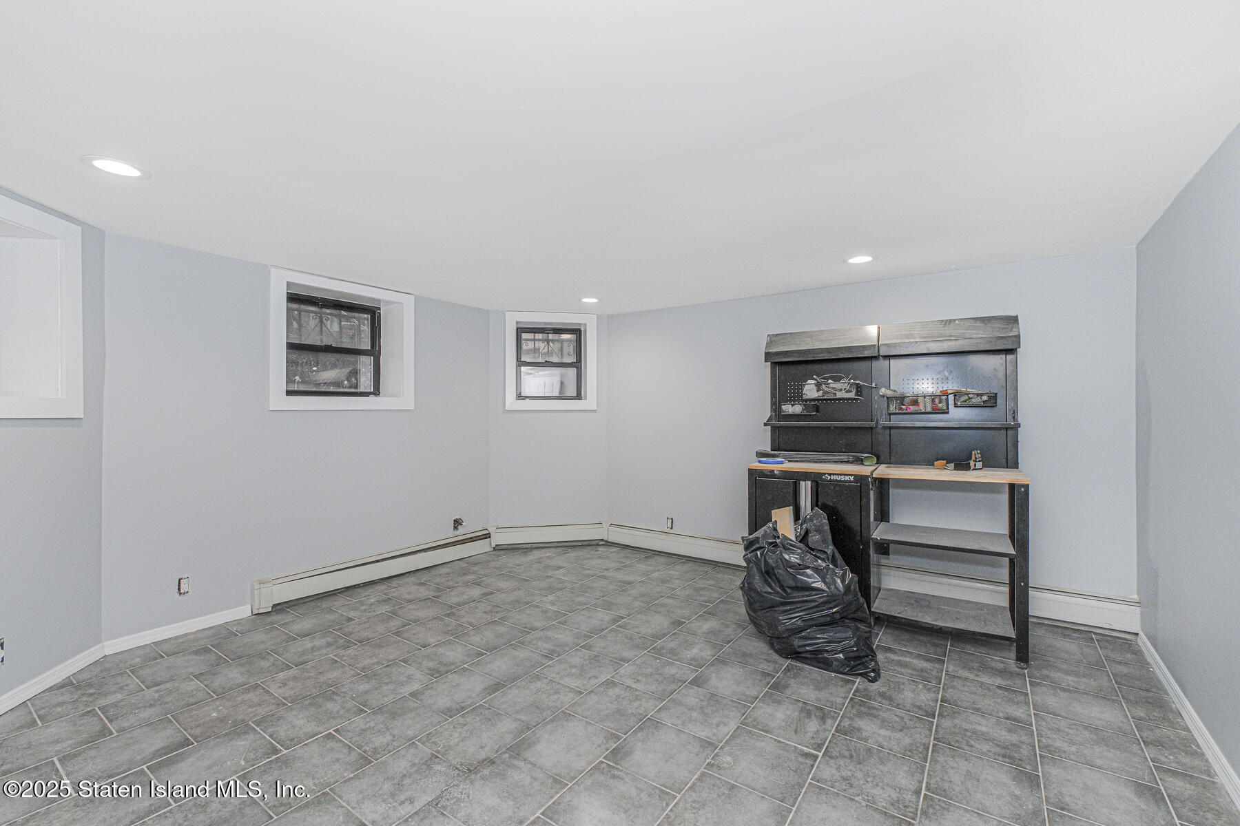 71 Sands Street Staten Island, NY 10304 - Photo 25 of 35 a view of room with racks on the wall