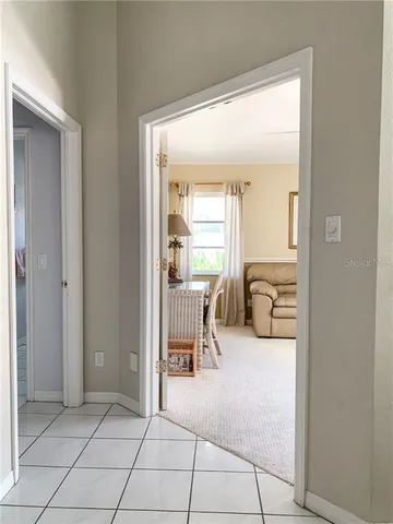 a balcony and view of living room