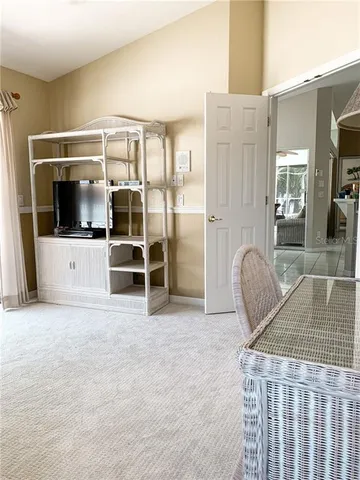 a view of livingroom with furniture and windows