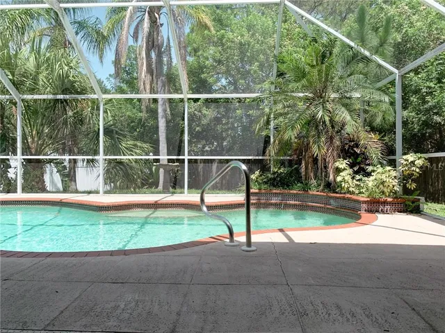 a view of a park with basketball court