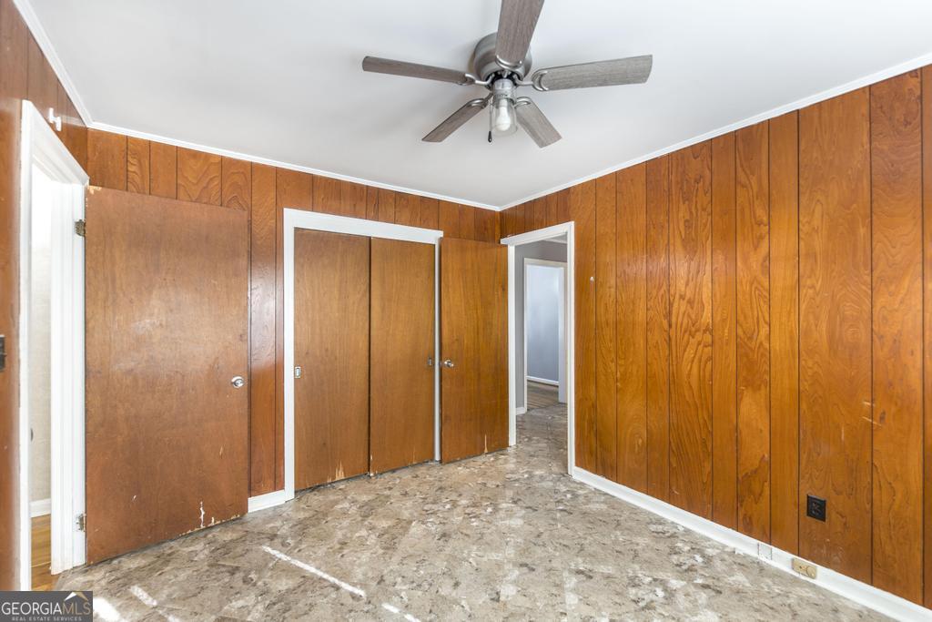 103 Thomas Street Dublin, GA 31021 - Photo 18 of 24 a view of a big room with carpet