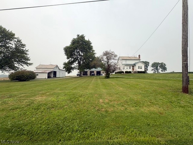 12666 South State Line Road Petersburg, OH 44454 - Photo 39 of 44 View from Road of State Line with Large Frontage and a circular Driveway