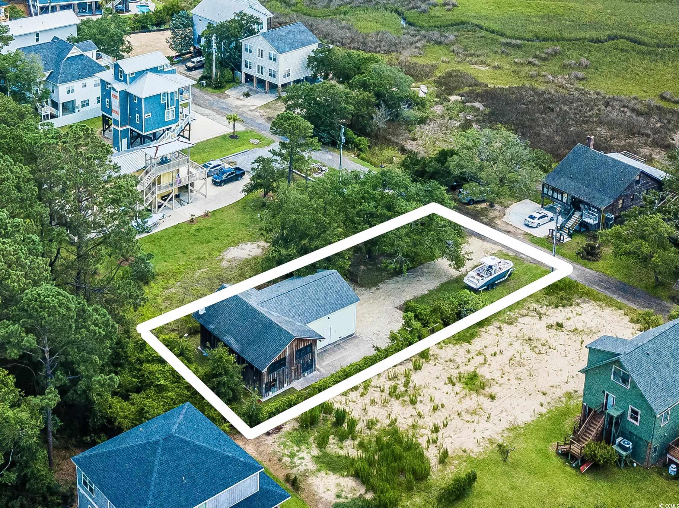 127 Brown Pelican Loop Pawleys Island, SC 29585 - Photo 24 of 31 Aerial view of property's location featuring property parcel outlined