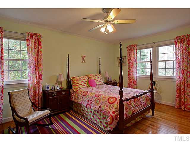 4701 Stiller Street Raleigh, NC 27609 - Photo 17 of 25 Bedroom 2 is one of three bedrooms and 2 baths located up a short flight of stairs. Bedroom