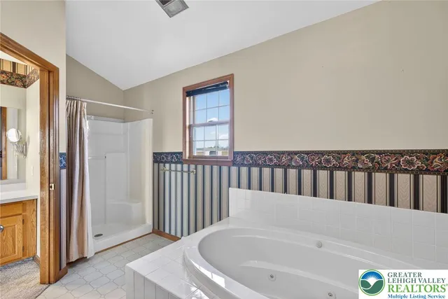 a white bath tub sitting in a bathroom