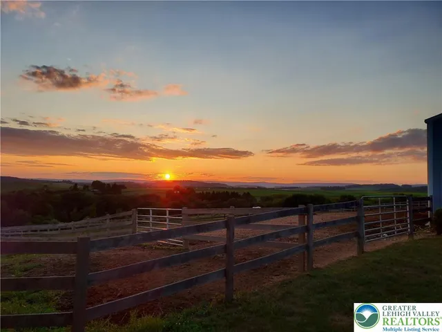 a view of an ocean and mountain