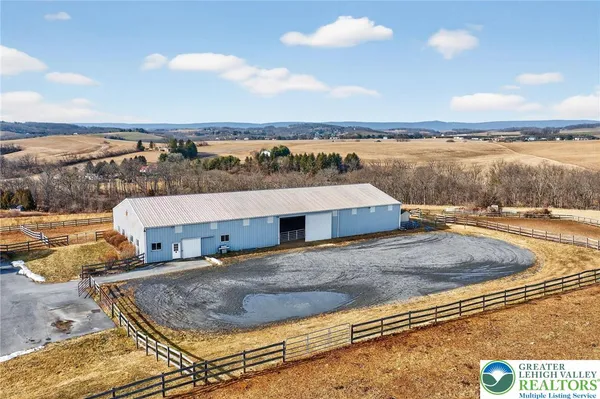 a view of a swimming pool with an ocean view