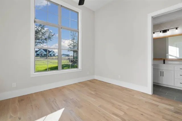 a view of a room that has a window in it
