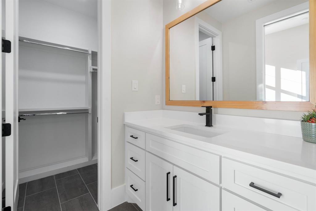 559 Aermotor Loop Weatherford, TX 76085 - Photo 18 of 39 a bathroom with a sink and a mirror