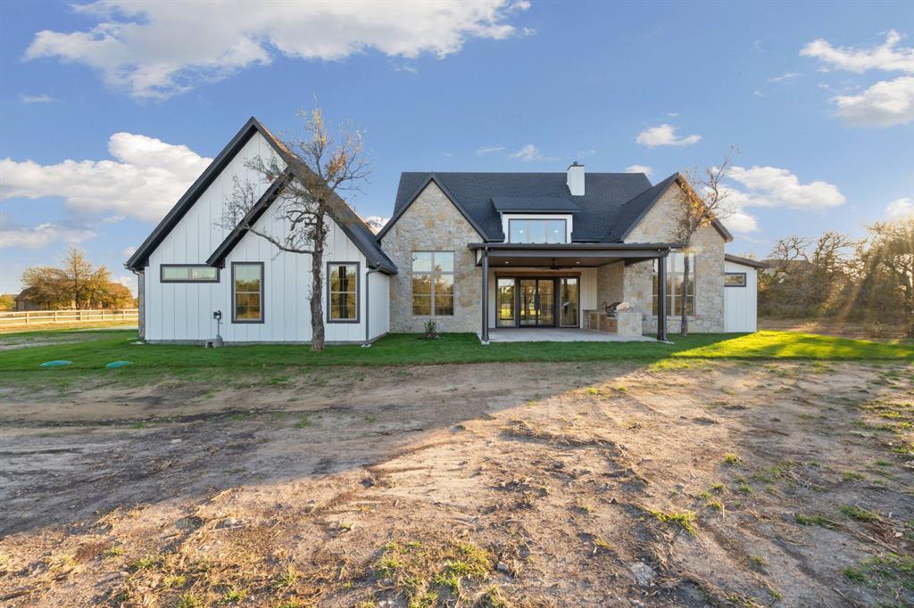 559 Aermotor Loop Weatherford, TX 76085 - Photo 39 of 39 a view of a house with a big yard and large trees