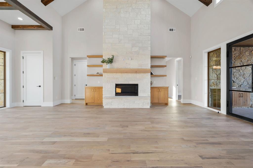 559 Aermotor Loop Weatherford, TX 76085 - Photo 9 of 39 a view of a livingroom with a fireplace