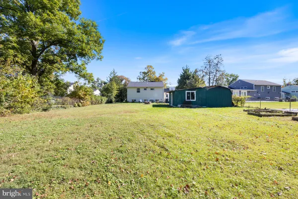 a view of a backyard with a garden