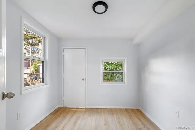 an empty room with windows