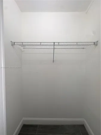 a view of small space with racks on the wall