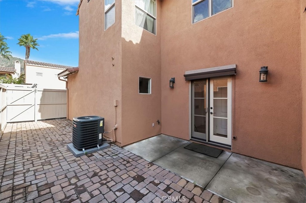 2454 Crossroads Court Duarte, CA 91010 - Photo 30 of 33 Patio as is. Comes with darkening window shade to protect from afternoon sun, but still allows a fresh breeze with screen door.