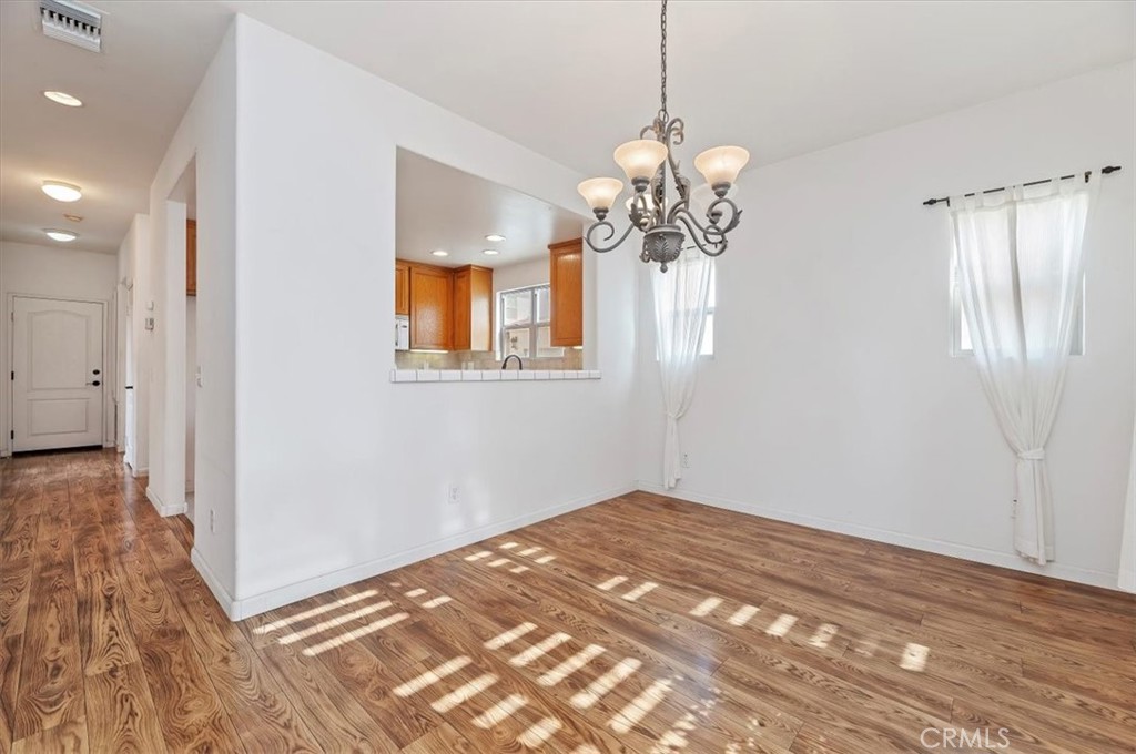 2454 Crossroads Court Duarte, CA 91010 - Photo 8 of 33 This dining room can accommodate round or rectangle tables.