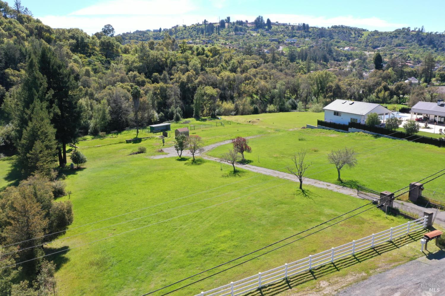 1360 Riebli Road Santa Rosa, CA 95404 - Photo 17 of 55 a view of a field with grass