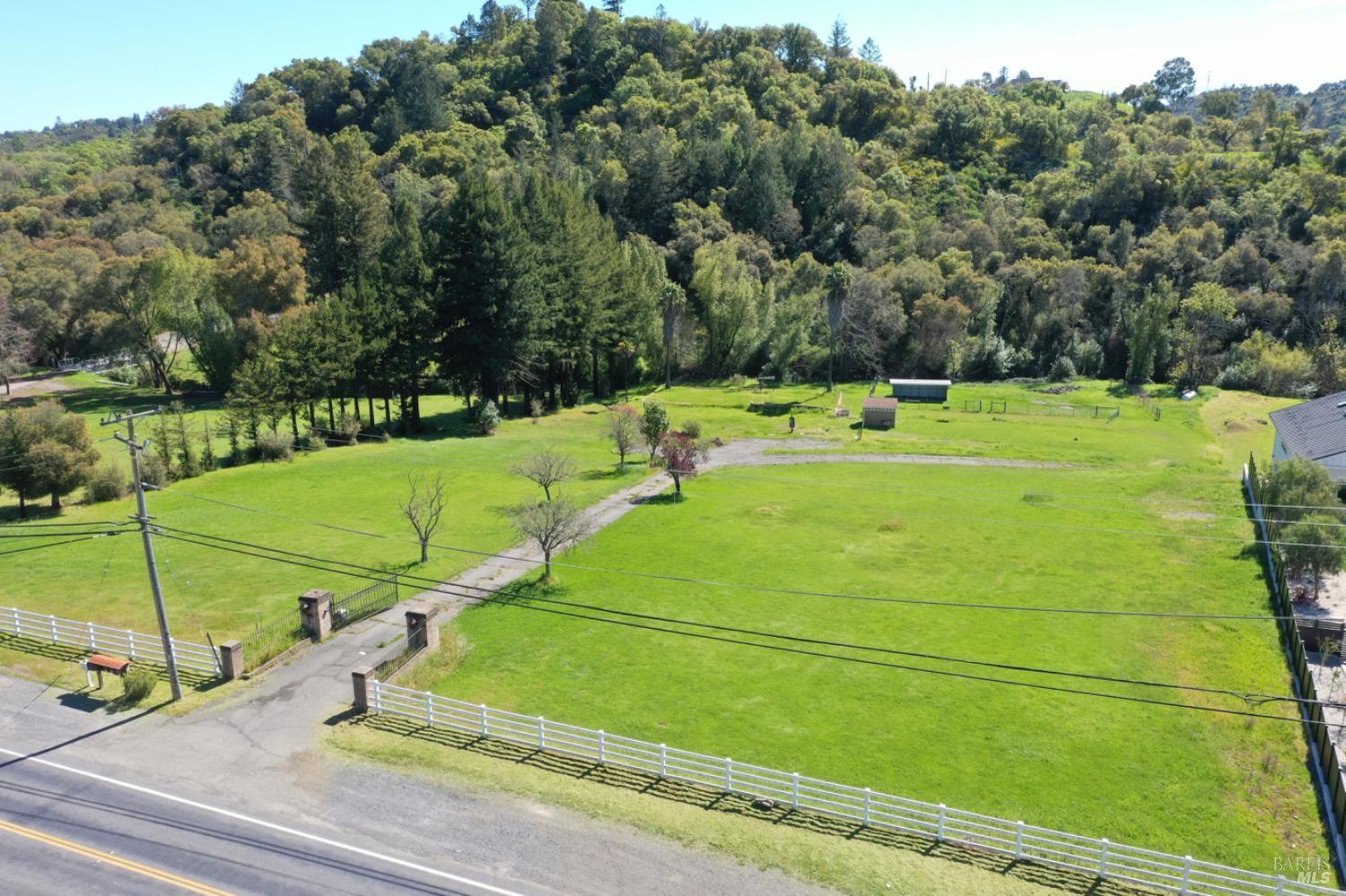 1360 Riebli Road Santa Rosa, CA 95404 - Photo 19 of 55 a view of a tennis ground with a small pool